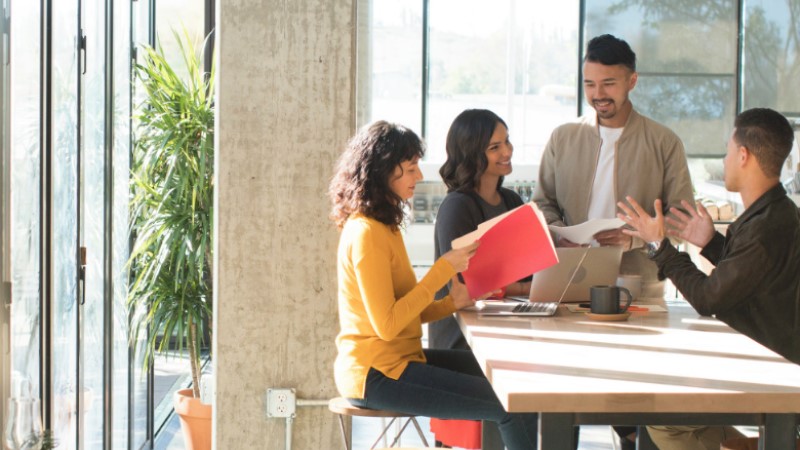 Employees collaborating in flex space