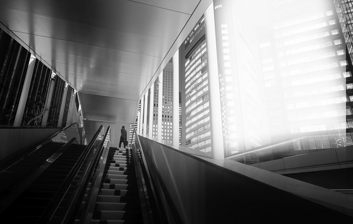 Man on escalator 