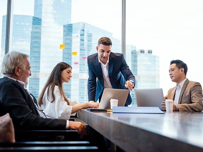 Group of business professionals planning and brainstorming a project, working together to discuss and develop innovative ideas