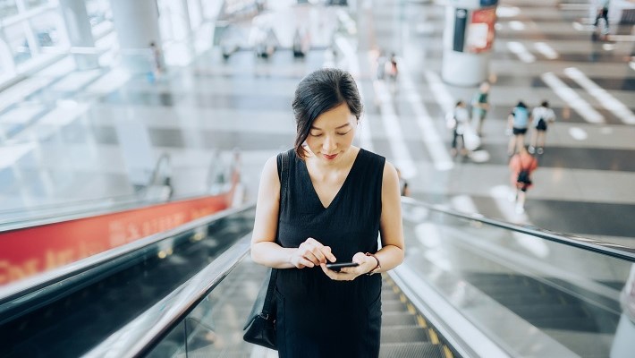 Woman on an escalator