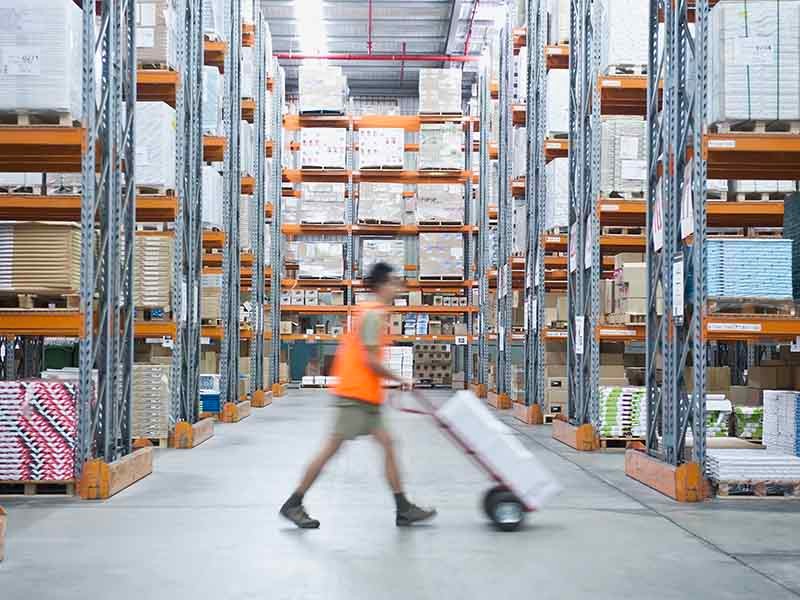 Man taking a goods in warehouse