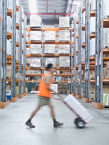 Man taking a goods in warehouse