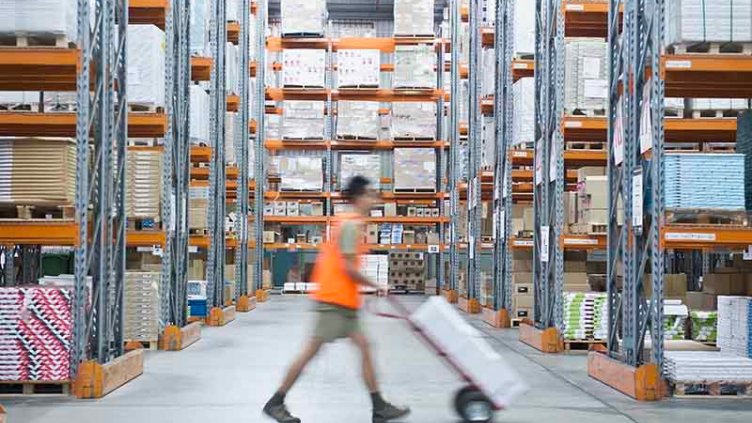 Man taking a goods in warehouse