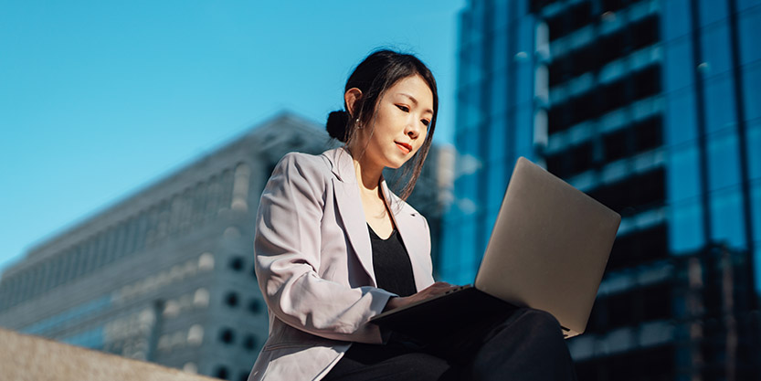 a woman working on a laptop