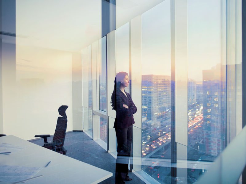 A woman looking out from the window